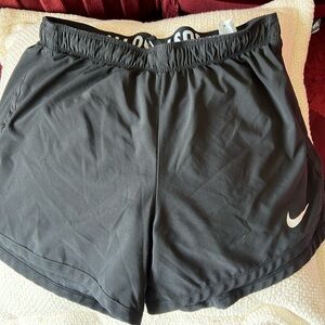Women’s black Nike running shorts